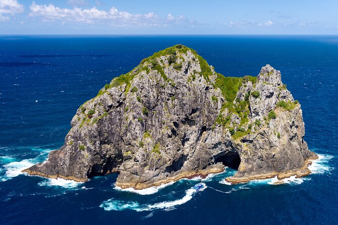 Bay of Islands Discovery Experience from Auckland incl. Hole In The Rock Cruise - Hole in the Rock Cruise: Iconic Cliffs, Dolphin Chances, and Spray-Ready Deck Time